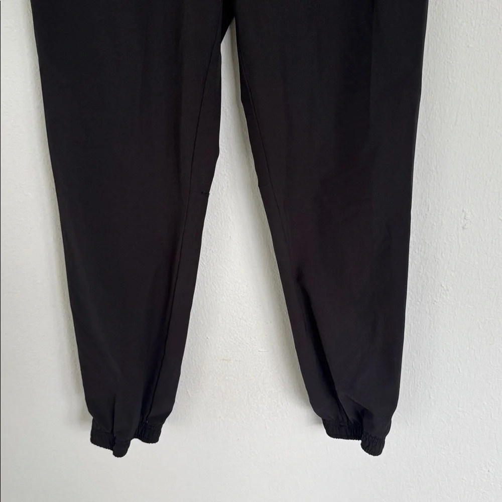 Athletic Works DriWorks girl’s black tapered ankle windbreaker joggers size XL